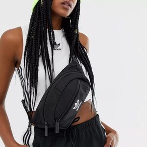 Adidas Originals fanny pack in black with taping strap